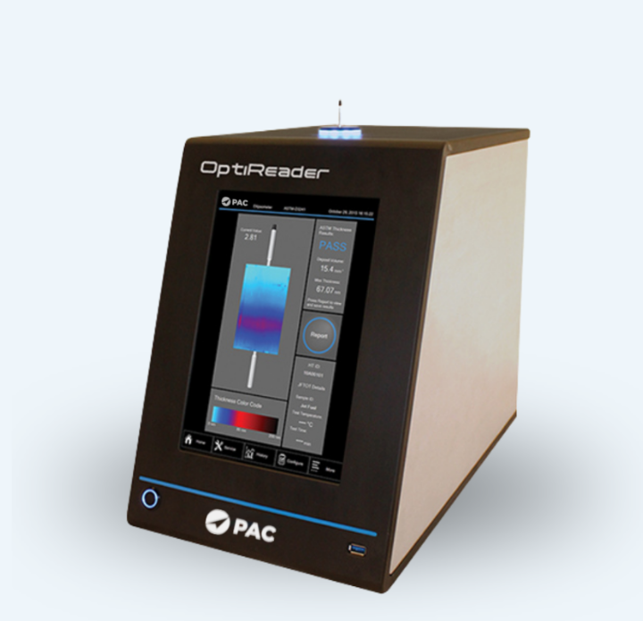 A PAC OptiReader device with a sleek, angled design and a touchscreen displaying measurement data. It has a modern, professional appearance.