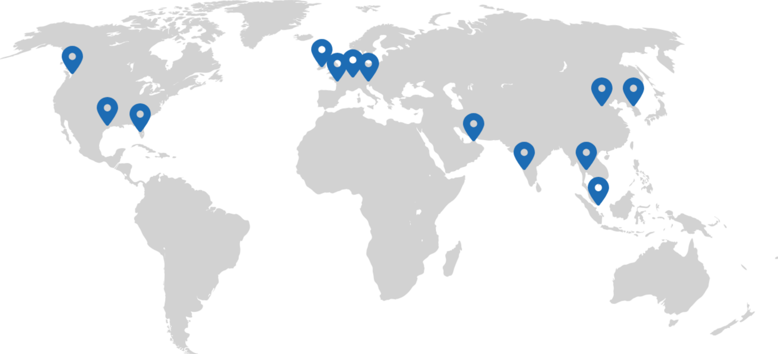 Global offices world map with gray continents shows blue location markers scattered across North America, Europe, Asia, and Southeast Asia.