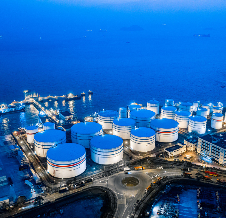 Storage tank of liquid chemical and petrochemical product tank, Aerial view at night. Hong Kong. Gas analysis